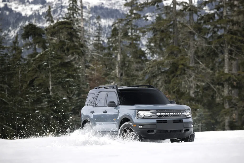 Ford Bronco Driving Through Snow