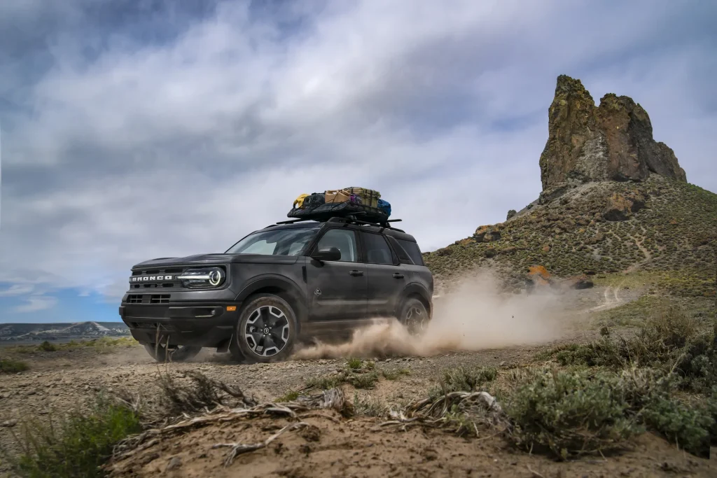Ford Bronco Driving Through a Mountainous Desert