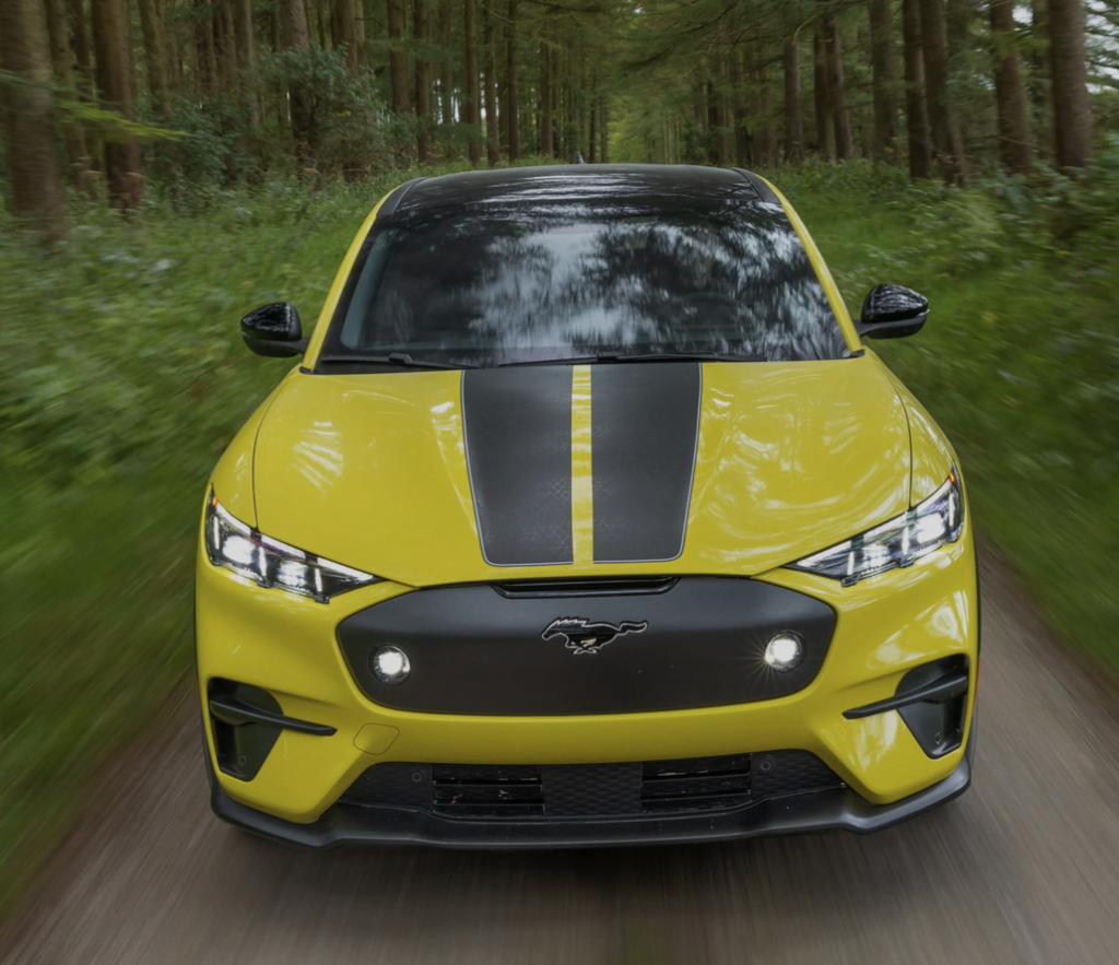 Ford Mustang Mach-E Driving on a Forest Road Front View