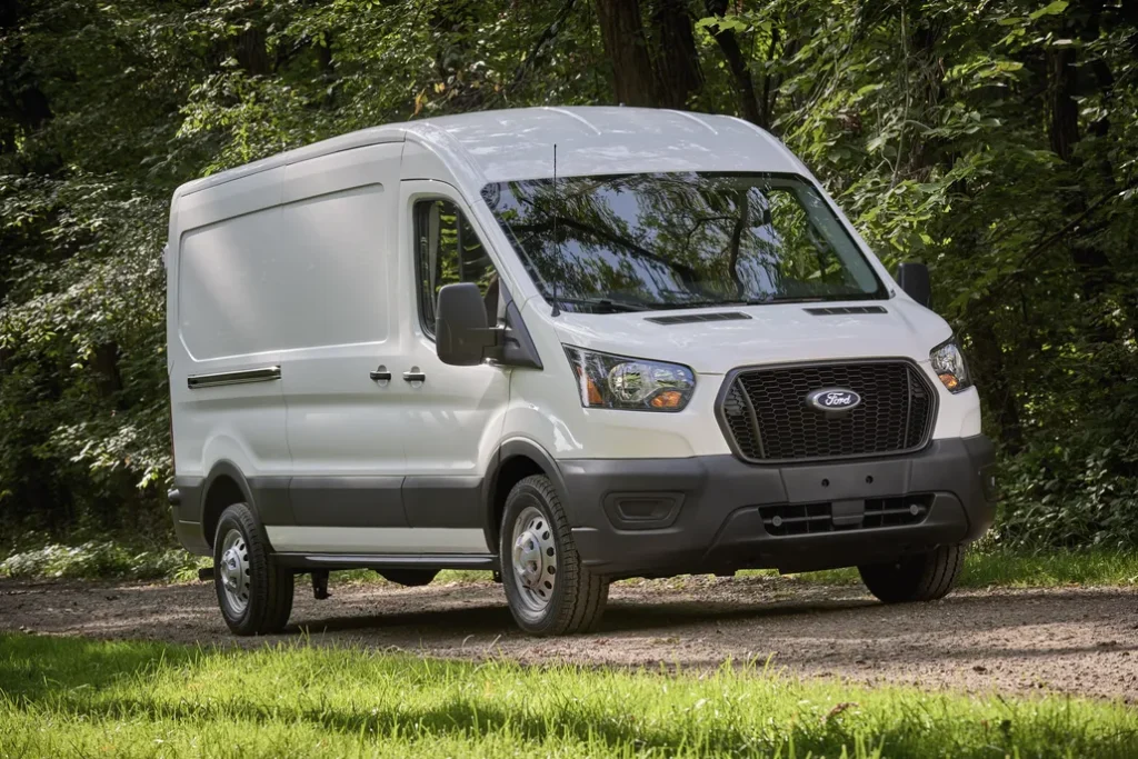 Ford E-Transit 350 Parked Front 3/4 View on a Gravel Road