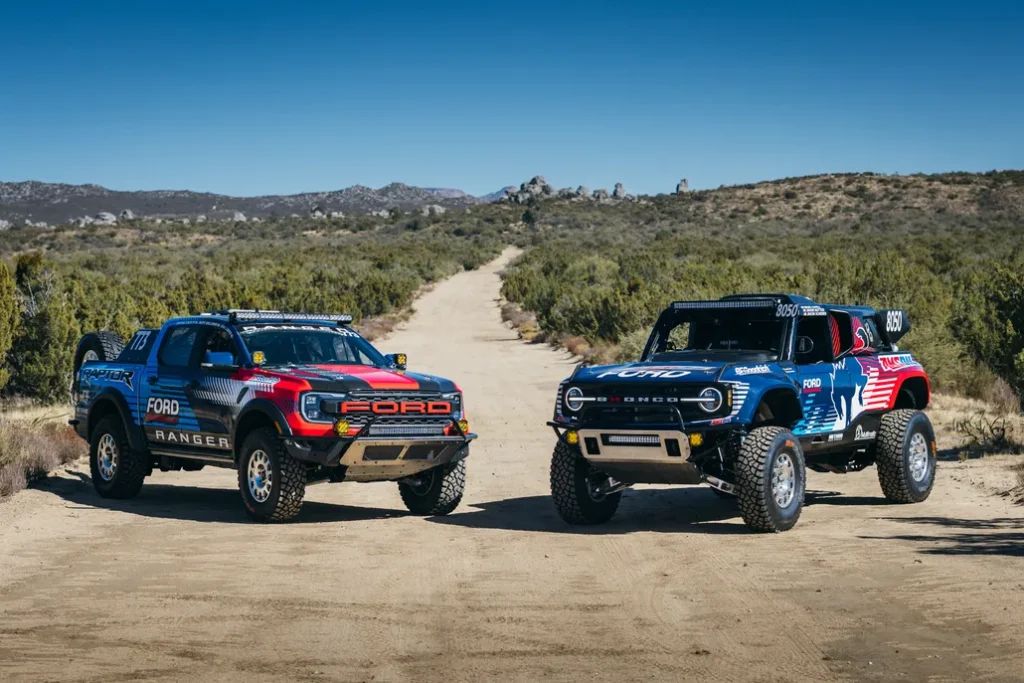 Ford Raptor Ranger and Bronco DR Parked on a Desert Road