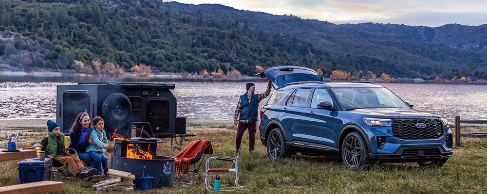 Family unloading camping gear from their Ford Explorer | Best Ford Vehicle for families