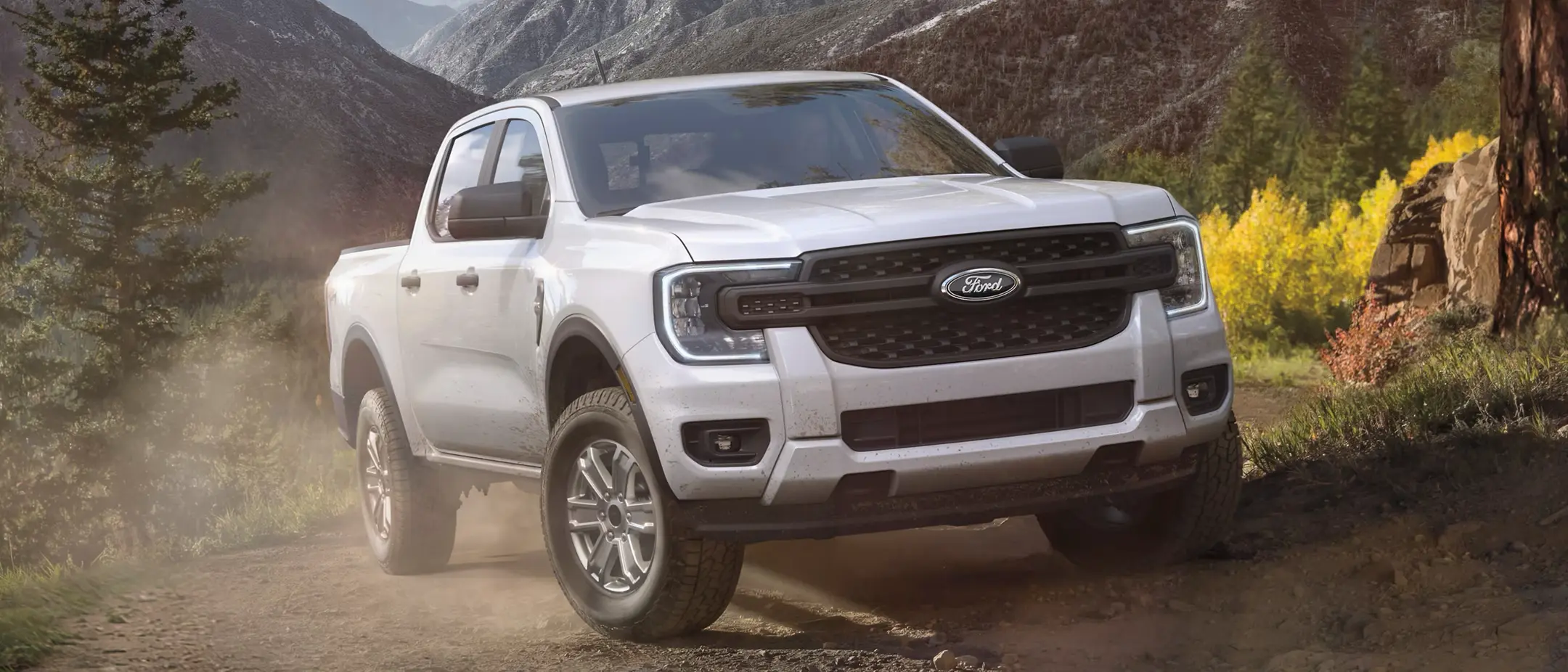 2025 Ford Ranger in white with aggressive stance and stylish exterior.